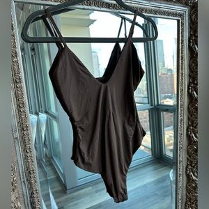 Brown white fox bodysuit in perfect condition